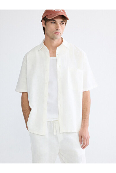 LC Waikiki قميص رجالي فضفاض من الكتان بمظهر إكرو