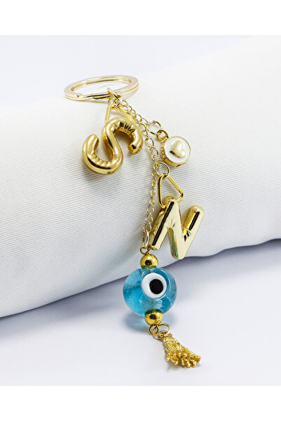 biuti Тюркоазено стъкло с мотив „зло око“ Златист метален ключодържател с две...