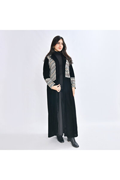 HAWRAA ABAYA A formal-style velvet abaya featuring geometric arabesque print ...