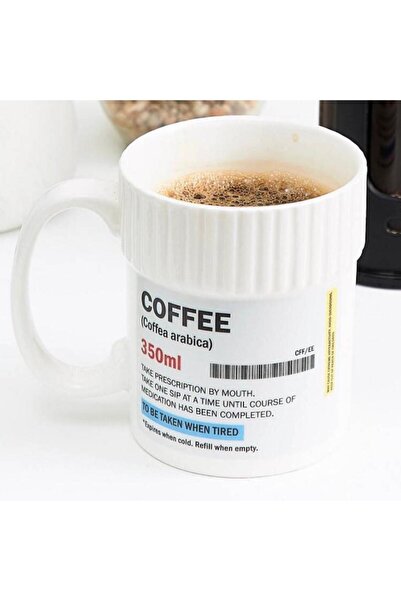 unkown A ceramic mug with medical prescriptions written on it.