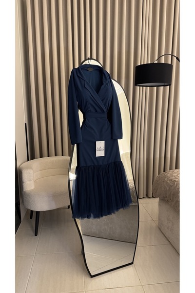 Nareen Fashion This dress, with its distinctive design and striking pattern t...