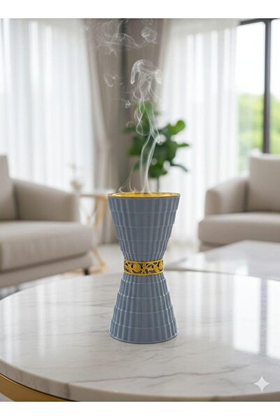 Generic A modern hourglass-shaped incense burner in gray and gold