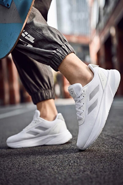 SOLAZER حذاء رياضي نسائي للمشي مصنوع من إسفنج ميموري فوم أبيض اللون