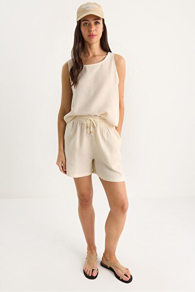 Hiccup Blouse with thick straps, elastic waist and shorts with pockets, Bianc...