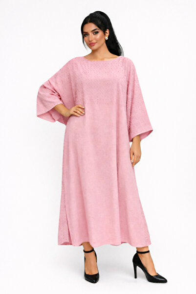 Al Afnan Boutique An elegant jalabiya made of lightweight linen fabric, delic...