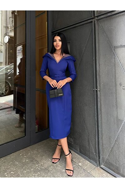 Miss Janell Midi blue dress with a dropped neckline and eye-catching details ...