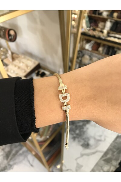 the ASEL İNCİ Harf Detaylı Taşlı Yılan Sırtı Model Bileklik ( D Harfi) kararmaz