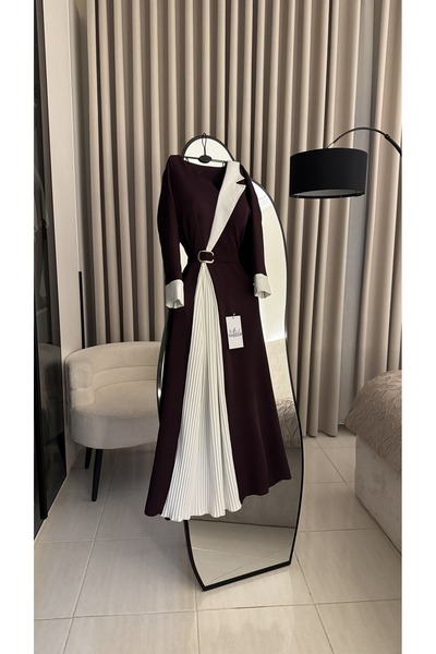 Nareen Fashion An elegant dress with a modern design that combines luxury and...