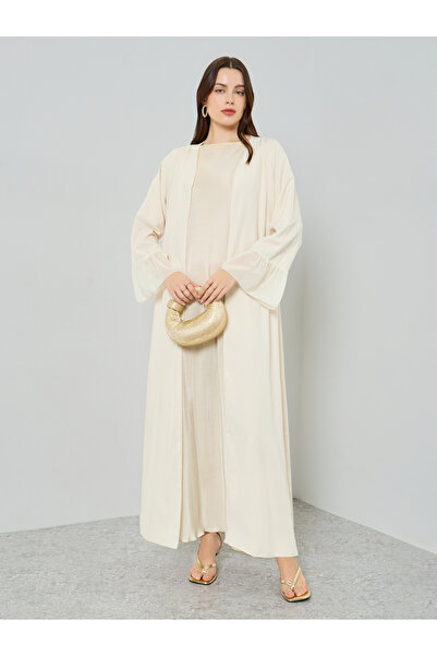 Styli عباية نسائية بيج بأكمام مكشكشة