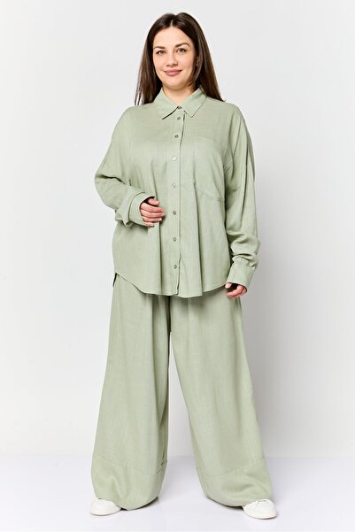 Anne Klein طقم نسائي من قطعتين: قميص بأكمام طويلة وياقة مدببة بنطلون واسع الأ...