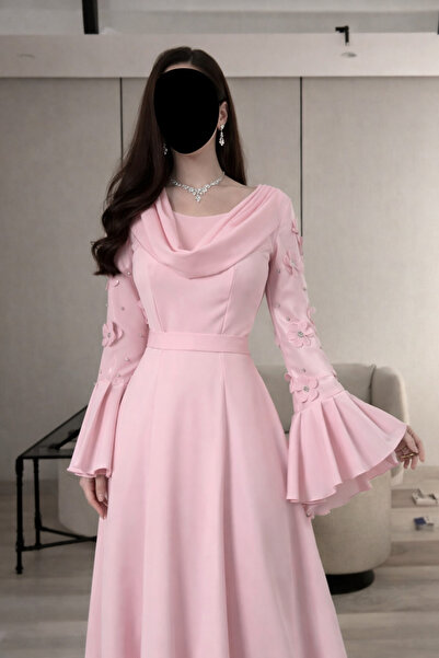 Lmsat A soft pink dress adorned with elegant flowers
