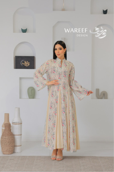 WAREEF FASHION Beige jalabiya with pink floral patterns and a flowing, serene...