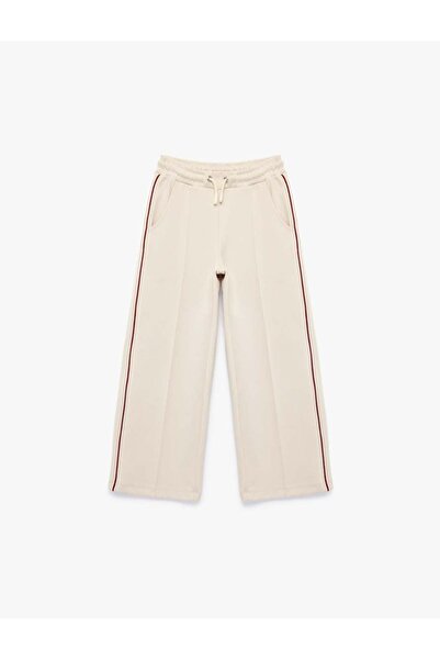 Koton Бежови широки панталони с връзки за момичета 6SKG40078AK