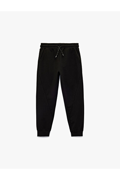 Koton Pantaloni de trening jogger cu două șnururi, detaliu buzunar și talie e...