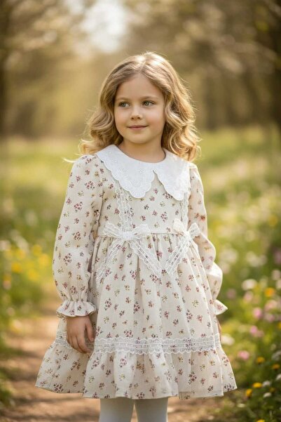 VİYOLİNA ÇİÇEKLİ FİYONK AKSESUARLI ELBİSE