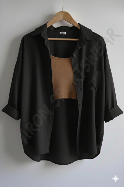 Shiron Sportswear&Company قميص نسائي أسود فاخر بكتف مكشوف وتفاصيل جيوب من الك...