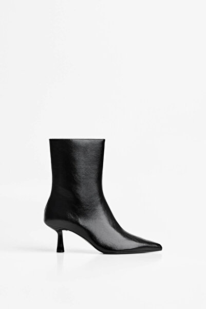 Cochines أحذية نسائية سوداء قصيرة عند الكاحل ذات مقدمة مدببة من الجلد عالي ال...