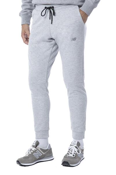 New Balance Šedé pánské tepláky Lifestyle - Mnp3804-ag