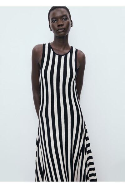 MANGO Woman Eteği asimetrik triko elbise