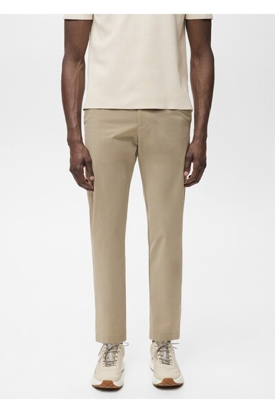 MANGO Man Slim Fit su tutmaz pantolon