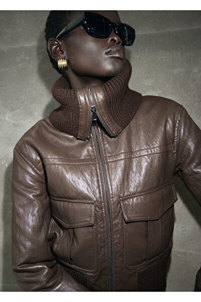 MANGO Woman Deri görünümlü, döner yakalı ceket