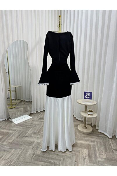 Model Leyna A luxurious evening dress combining black and white