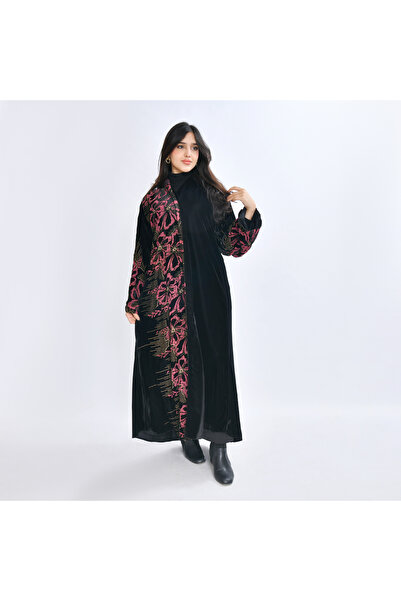 HAWRAA ABAYA An abaya designed from soft black velvet fabric, featuring an el...