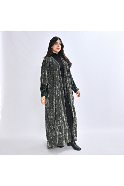 HAWRAA ABAYA An elegant quarter-bisht abaya made from luxurious velvet fabric...