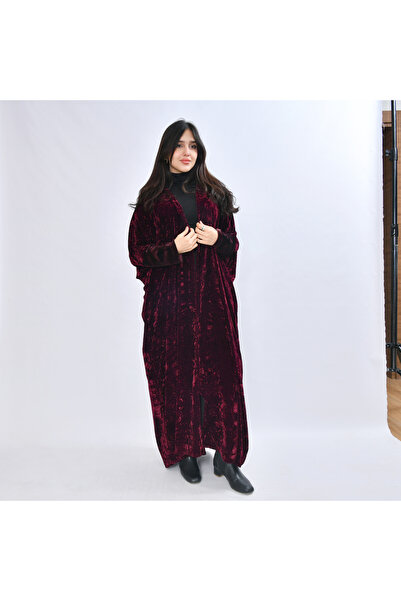 HAWRAA ABAYA An elegant quarter-bisht abaya, made from luxurious burgundy vel...