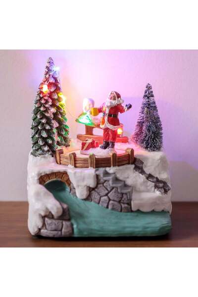 OEM Scena de Craciun cu Mos Craciun Rau cu Apa Lumina & Miscare 12x10x15cm