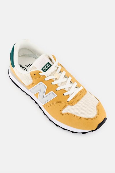 New Balance Men GM500ITG Lace Up Outdoor Shoes, Mustard