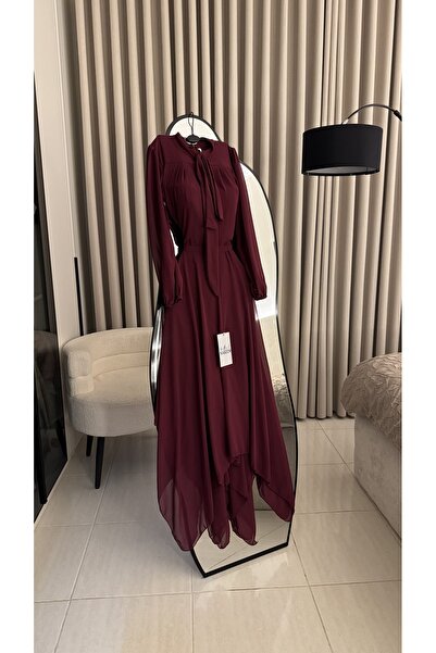Nareen Fashion A long-sleeved burgundy dress with an elegant and sophisticate...