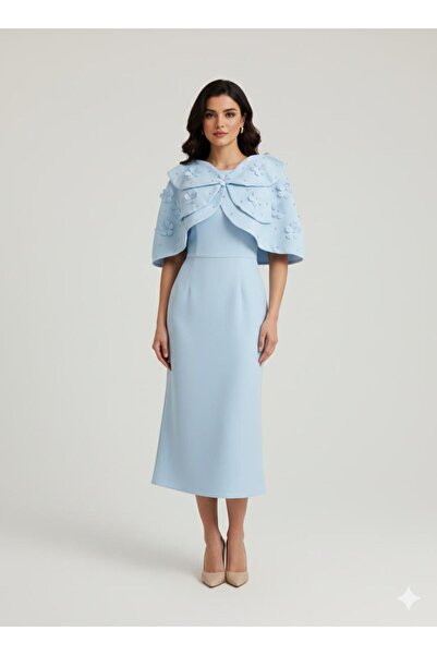 Azyaa Al-Amira A soft, sky-blue evening gown with a rose-embroidered cape - a...