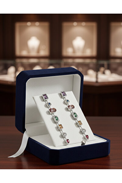 mischa jewelry أقراط فضية اللون بتفاصيل حجرية أنيقة - سلسلة هندسية فاخرة