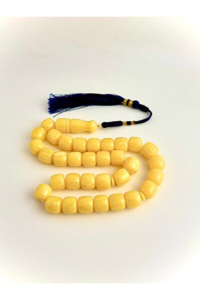 221331 An elegant rosary made of amber dust, with a handmade tassel.