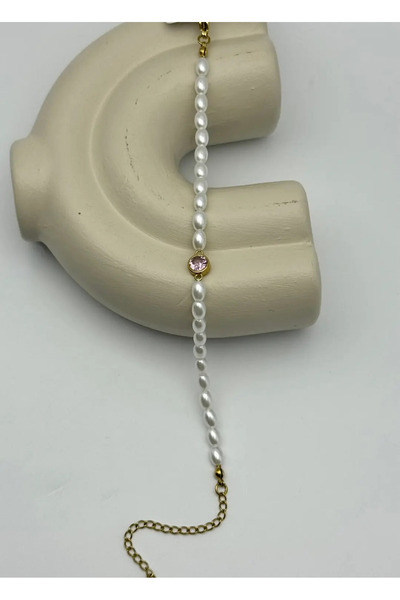 BİJU YILMAZ سوار شوبينغ ذهبي اللون مرصع باللؤلؤ الوردي - 25-xpb129