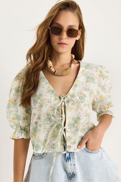 Hiccup Bianco Lucci floral Printed muslin blouse with knots and elastic sleeves