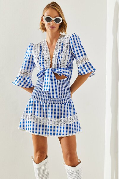 Hiccup Bianco Lucci dress with front knots, checkered details and eyelets