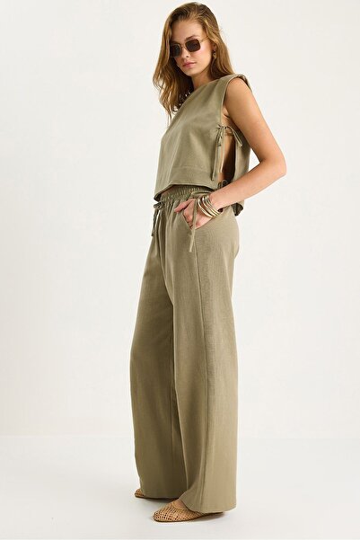 Hiccup Two-piece set with round neck and knot closure and wide-leg trousers