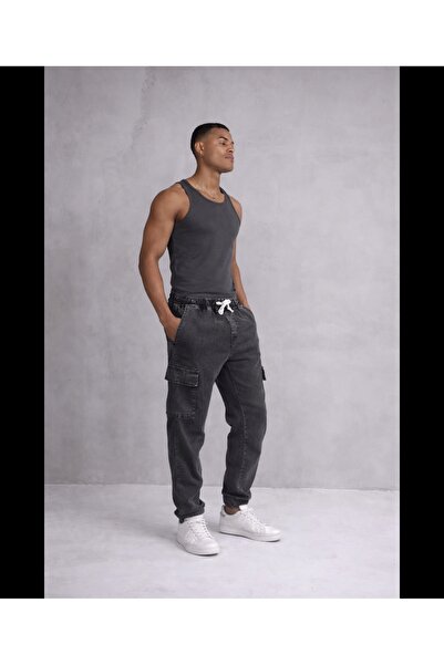 MASTIFF بنطلون جينز رجالي بقصة مريحة مع تفاصيل مطاطية عند الأرجل