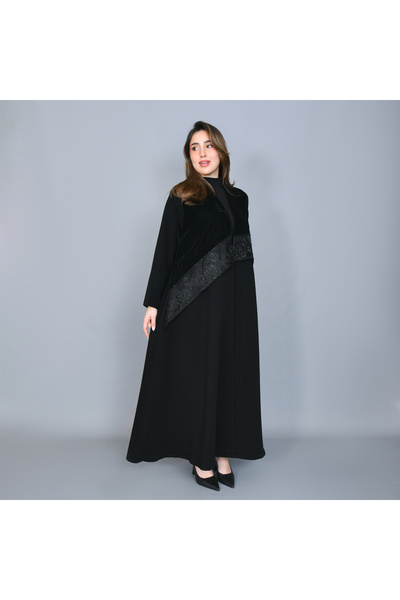 HAWRAA ABAYA A sophisticated black abaya with an intricate black velvet overl...