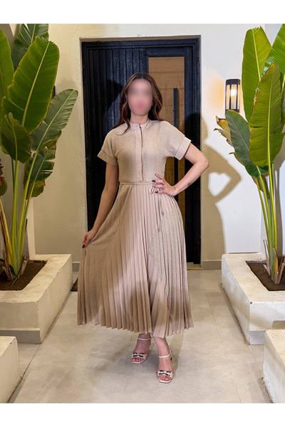 REVE Beige midi dress, with a defined waist, pleated skirt, and elegant short...