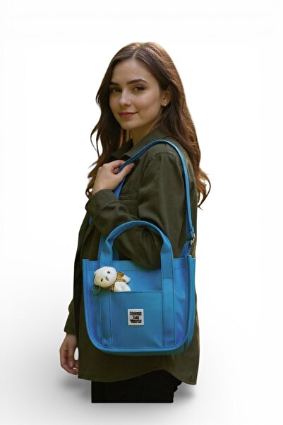 madbag حقيبة يد وكتف من قماش بوزي مع حزام كتف على شكل دمية دب