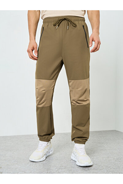 Styli Men Brown Color Block Track Pants