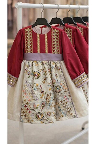 La reina petite Girls' heritage fuchsia dress with gold embroidery and embell...