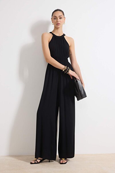 Trendyol Collection Schwarzer gewebter Maxi-Jumpsuit mit weitem Bein und gera...