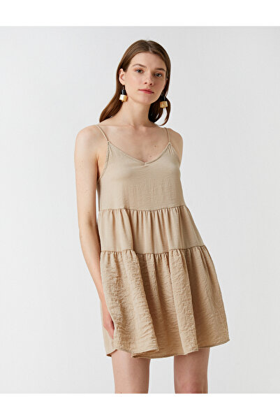 Koton Gestuftes Minikleid mit V-Ausschnitt aus Aerobin-Stoff