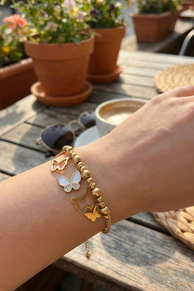 Duke Nickle سوار من الفولاذ مع شكل فراشة