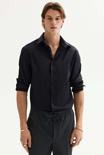 H&M قميص مطاطي بقصّة Slim Fit