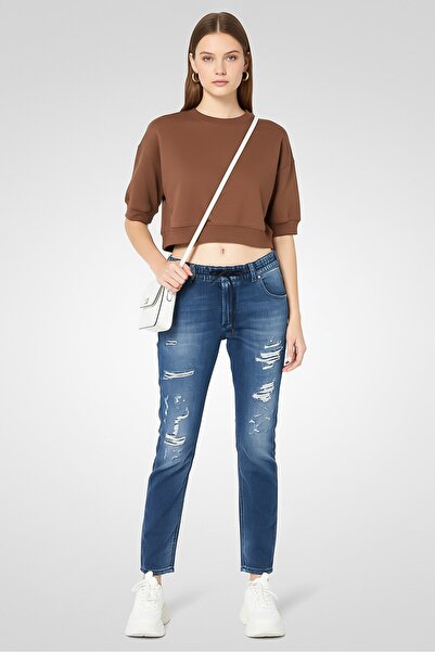 Diesel بنطلون جينز ممزق مطاطي بقصة عادية للنساء، أزرق